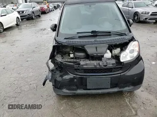 2012 Smart fortwo Pure with VIN WMEEJ3BAXCK568065, listed as a Copart auction lot 84398194 with 73,989 mi miles and Clean title. Bid and sale history available at DreamBid. Image 11.