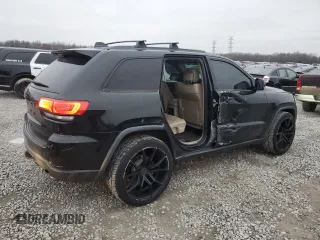 2014 Jeep Grand Cherokee Limited with VIN 1C4RJEBT5EC213332, listed as a Copart auction lot 87583515 with 152,409 mi miles and Salvage Title. Bid and sale history available at DreamBid. Image 3.
