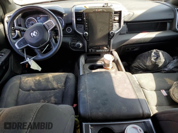 2023 Ram 1500 Big Horn with VIN 1C6SRFFM3PN520774, listed as a Copart auction lot 64585325 with Not provided miles and Salvage title. Bid and sale history available at DreamBid. Image 8.