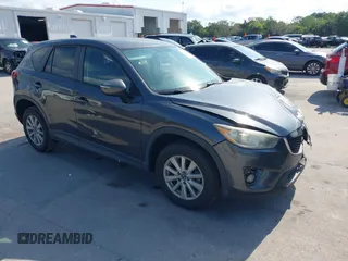 2015 Mazda CX-5 Touring with VIN JM3KE2CY9F0468199, listed as a IAAI auction lot 42099253 with 110,909 mi miles and . Bid and sale history available at carsss.com. Image 1.