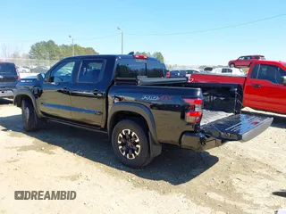2024 Nissan Frontier Pro-4X with VIN 1N6ED1EK3RN654112, listed as a IAAI auction lot 41686345 with 14,893 mi miles and . Bid and sale history available at DreamBid. Image 3.