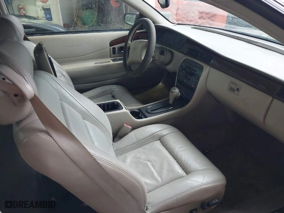 1999 Cadillac Eldorado ESC with VIN 1G6EL12Y8XU612393, listed as a IAAI auction lot 41761839 with 104,994 mi miles. Bid and sale history available at carsss.com. Image 5.