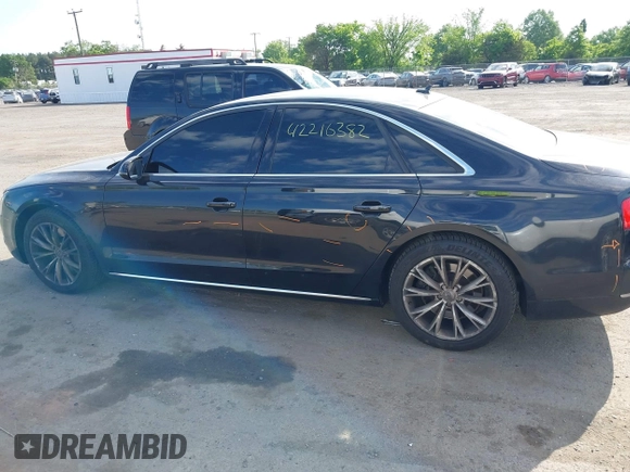 2012 Audi A8 with VIN WAUAVAFD8CN029546, listed as a IAAI auction lot 42216382 with 144,989 mi miles and . Bid and sale history available at DreamBid. Image 14.