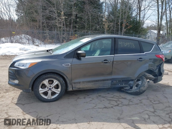 2015 Ford Escape SE with VIN 1FMCU0GXXFUB99852, listed as a IAAI auction lot 41704198 with 84,735 mi miles. Bid and sale history available at carsss.com. Image 14.