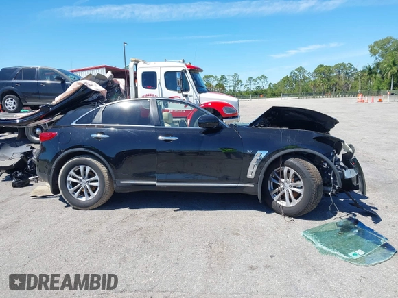 2014 Infiniti QX70 с VIN JN8CS1MU7EM451585, выставлен на аукционе IAAI как лот 41861091 с пробегом Не указан миль и . История ставок и продаж доступна на DreamBid. Изображение 13.