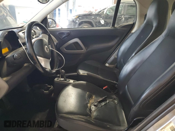 2013 Smart fortwo Pure с VIN WMEEJ3BA9DK626037, выставлен на аукционе Copart как лот 54573255 с пробегом 66 070 миль миль и Чистый • Clean title. История ставок и продаж доступна на DreamBid. Изображение 7.