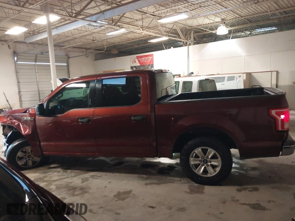 2015 Ford F-150 XLT with VIN 1FTEW1C84FKD05672, listed as a IAAI auction lot 41366154 with 119,504 mi miles and . Bid and sale history available at carsss.com. Image 14.