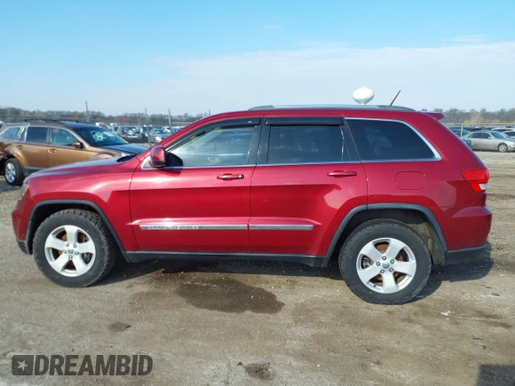 2013 Jeep Grand Cherokee Laredo with VIN 1C4RJEAG9DC538259, listed as a IAAI auction lot 41832676 with 143,000 mi miles. Bid and sale history available at carsss.com. Image 14.