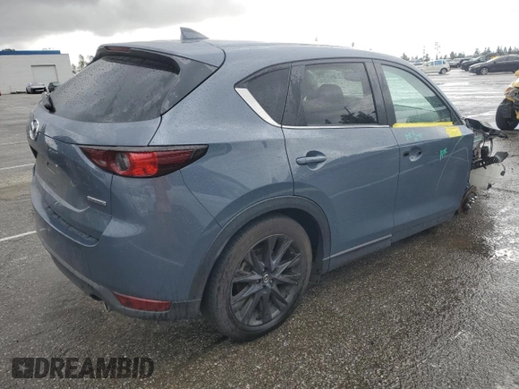 2021 Mazda CX-5 Touring with VIN JM3KFACM3M0420425, listed as a Copart auction lot 47993745 with 56,184 mi miles and Salvage Title. Bid and sale history available at carsss.com. Image 3.