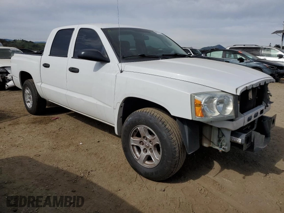 2005 Dodge Dakota SLT with VIN 1D7HE48N35S263600, listed as a Copart auction lot 46705555 with 128,519 mi miles and Salvage Title. Bid and sale history available at DreamBid. Image 4.