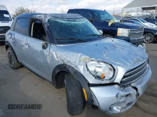 2015 MINI Countryman with VIN WMWZB3C56FWR43359, listed as a IAAI auction lot 40720320 with 69,898 mi miles and . Bid and sale history available at DreamBid. Image 1.