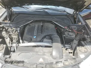2015 BMW X6 xDrive35i z VIN 5UXKU2C58F0N77513, wystawiony jako Copart lot #55859345 z przebiegiem 82 560 mil mil oraz Szkoda całkowita • Salvage title. Historia ofert i sprzedaży dostępna na DreamBid. Obrazek 12.