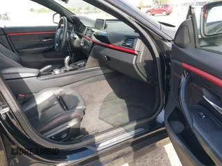 2015 BMW 4 Series 428i z VIN WBA4A9C5XFD416873, wystawiony jako IAAI lot #42108645 z przebiegiem 93 433 mil mil oraz . Historia ofert i sprzedaży dostępna na DreamBid. Obrazek 5.