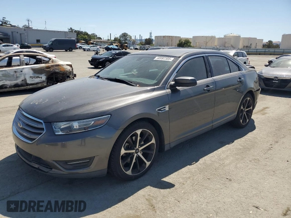 2015 Ford Taurus SEL with VIN 1FAHP2E8XFG209390, listed as a Copart auction lot 58992305 with 99,498 mi miles and Salvage title. Bid and sale history available at DreamBid. Image 1.