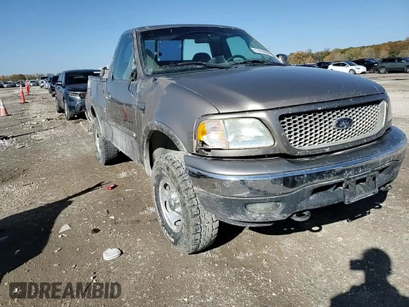 2001 Ford F-150 XL with VIN 1FTRF18W71NB69621, listed as a Copart auction lot 77816954 with Not provided miles and Salvage title. Bid and sale history available at DreamBid. Image 11.