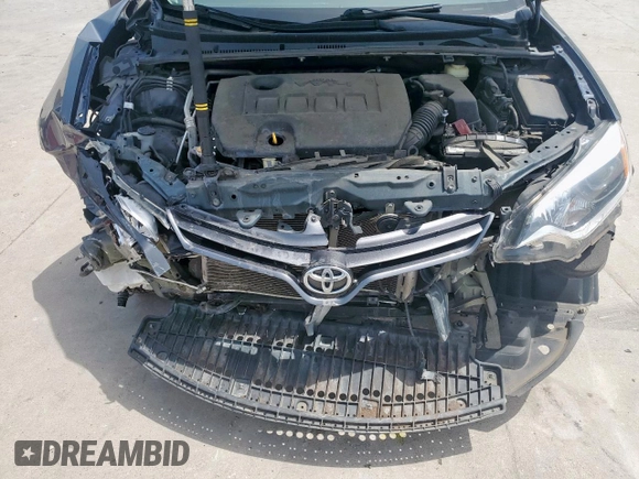 2016 Toyota Corolla L z VIN 5YFBURHE7GP485545, wystawiony jako Copart lot #58166915 z przebiegiem 102 557 mil mil oraz Szkoda całkowita • Salvage title. Historia ofert i sprzedaży dostępna na DreamBid. Obrazek 11.