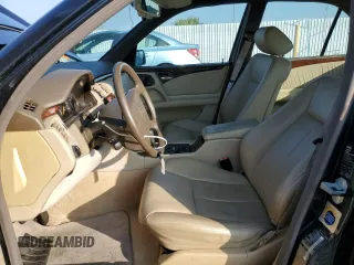 1997 Mercedes-Benz E 320 with VIN WDBJF55FXVA430115, listed as a Copart auction lot 43053715 with 158,057 mi miles and Clean Title. Bid and sale history available at DreamBid. Image 7.