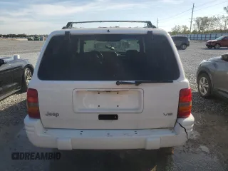 1998 Jeep Grand Cherokee Laredo with VIN 1J4GZ48Y9WC203024, listed as a Copart auction lot 83813114 with 105,044 mi miles and Non Repairable. Bid and sale history available at carsss.com. Image 6.