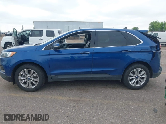 2022 Ford Edge Titanium with VIN 2FMPK4K95NBB05789, listed as a IAAI auction lot 42582372 with 58,379 mi miles and . Bid and sale history available at DreamBid. Image 14.