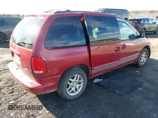1999 Dodge Caravan z VIN 1B4GP45G7XB554879, wystawiony jako IAAI lot #41644242 z przebiegiem Nie podano mil oraz . Historia ofert i sprzedaży dostępna na DreamBid. Obrazek 4.