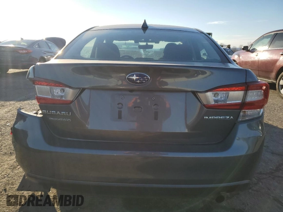 2021 Subaru Impreza Premium with VIN 4S3GKAV67M3604791, listed as a Copart auction lot 88542615 with 24,821 mi miles and Salvage title. Bid and sale history available at DreamBid. Image 6.