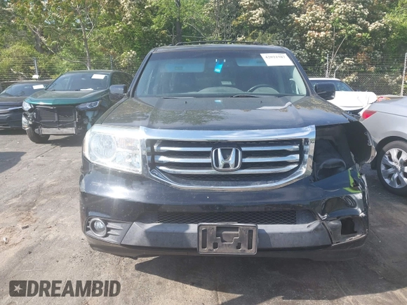 2012 Honda Pilot Touring with VIN 5FNYF4H95CB026191, listed as a IAAI auction lot 42021987 with 229,273 mi miles and . Bid and sale history available at DreamBid. Image 12.