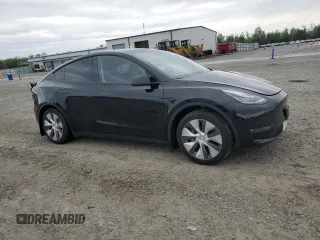 2022 Tesla Model Y Long Range with VIN 7SAYGDEE9NF436674, listed as a Copart auction lot 51478395 with 47,355 mi miles and Salvage Title. Bid and sale history available at carsss.com. Image 4.