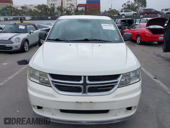 2013 Dodge Journey American Value with VIN 3C4PDCAB9DT547538, listed as a IAAI auction lot 42407702 with 152,659 mi miles and . Bid and sale history available at DreamBid. Image 12.