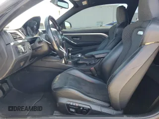 2015 BMW M4 with VIN WBS3R9C50FK333819, listed as a Copart auction lot 61105565 with 168,932 mi miles and Salvage title. Bid and sale history available at DreamBid. Image 7.