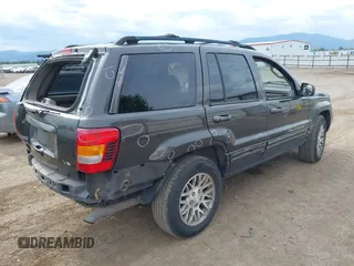 2004 Jeep Grand Cherokee Limited with VIN 1J4GW58N54C372118, listed as a IAAI auction lot 42526424 with 187,430 mi miles and . Bid and sale history available at DreamBid. Image 4.