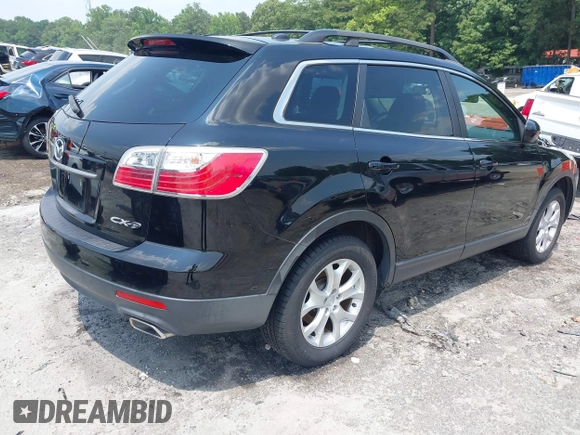 2011 Mazda CX-9 Touring with VIN JM3TB2CA3B0317661, listed as a IAAI auction lot 42385027 with 189,273 mi miles and . Bid and sale history available at DreamBid. Image 4.