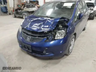 2013 Honda Fit with VIN JHMGE8H37DC068649, listed as a IAAI auction lot 41556430 with 127,748 mi miles. Bid and sale history available at carsss.com. Image 6.