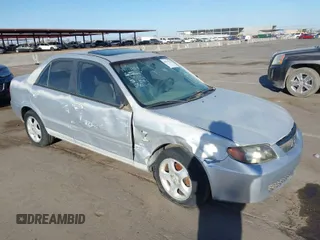 2002 Mazda Protege DX with VIN JM1BJ225X20639872, listed as a IAAI auction lot 41712272 with 145,118 mi miles and . Bid and sale history available at DreamBid. Image 1.
