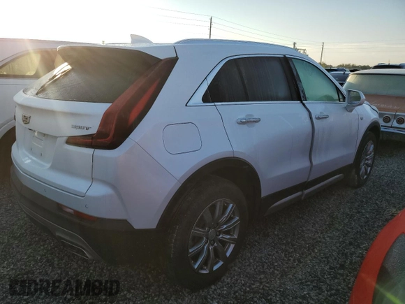 2020 Cadillac XT4 FWD Premium Luxury z VIN 1GYFZCR49LF118146, wystawiony jako Copart lot #82495614 z przebiegiem Nie podano mil oraz Nie do naprawy • Non repairable. Historia ofert i sprzedaży dostępna na DreamBid. Obrazek 3.