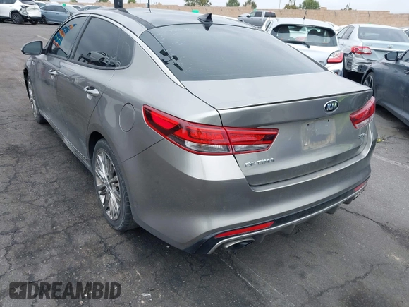 2017 Kia Optima SX Limited z VIN 5XXGV4L20HG169787, wystawiony jako IAAI lot #42194580 z przebiegiem 89 035 mil mil oraz . Historia ofert i sprzedaży dostępna na DreamBid. Obrazek 3.