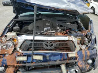 2014 Toyota Tacoma with VIN 5TFLU4EN7EX106909, listed as a Copart auction lot 46906235 with 102,681 mi miles and Salvage Title. Bid and sale history available at DreamBid. Image 12.