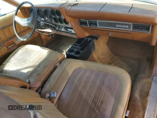 1977 Mercury Cougar z VIN 7A93H513790, wystawiony jako Copart lot #49360465 z przebiegiem 11 729 mil mil oraz Czysty tytuł • Clean title. Historia ofert i sprzedaży dostępna na DreamBid. Obrazek 8.