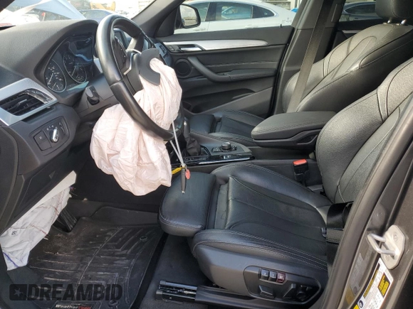 2018 BMW X1 sDrive28i with VIN WBXHU7C3XJ5H38906, listed as a Copart auction lot 36572583 with 71,860 mi miles. Bid and sale history available at carsss.com. Image 7.