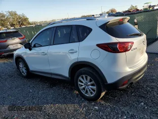 2016 Mazda CX-5 Sport with VIN JM3KE2BY3G0877107, listed as a Copart auction lot 87621635 with 83,093 mi miles and Salvage Title. Bid and sale history available at carsss.com. Image 2.