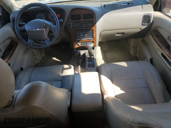 1997 Infiniti QX4 z VIN JNRAR05Y4VW015288, wystawiony jako Copart lot #48034505 z przebiegiem 289 030 mil mil oraz Szkoda całkowita • Salvage title. Historia ofert i sprzedaży dostępna na DreamBid. Obrazek 8.