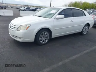 2007 Toyota Avalon XL with VIN 4T1BK36B97U252227, listed as a IAAI auction lot 42067958 with 245,781 mi miles. Bid and sale history available at carsss.com. Image 2.