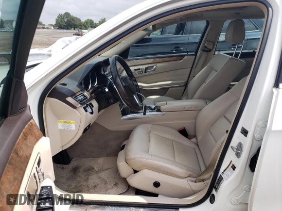 2014 Mercedes-Benz E 350 Luxury with VIN WDDHH8JBXEA803917, listed as a Copart auction lot 80199464 with 108,800 mi miles and Salvage Title. Bid and sale history available at DreamBid. Image 7.