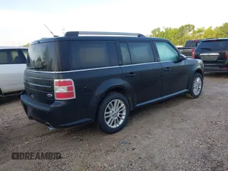 2014 Ford Flex SEL z VIN 2FMGK5C8XEBD24744, wystawiony jako IAAI lot #42365734 z przebiegiem 209 904 mil mil oraz . Historia ofert i sprzedaży dostępna na DreamBid. Obrazek 4.