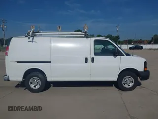 2014 Chevrolet Express Cargo with VIN 1GCWGFCA5E1121007, listed as a IAAI auction lot 42505878 with 178,916 mi miles and . Bid and sale history available at DreamBid. Image 13.