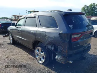 2015 Dodge Durango SXT with VIN 1C4RDHAG0FC771247, listed as a IAAI auction lot 42463389 with 171,668 mi miles and . Bid and sale history available at DreamBid. Image 3.