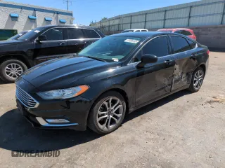 2017 Ford Fusion SE z VIN 3FA6P0H75HR379134, wystawiony jako Copart lot #57039185 z przebiegiem 105 032 mil mil oraz Szkoda całkowita • Salvage title. Historia ofert i sprzedaży dostępna na DreamBid. Obrazek 1.