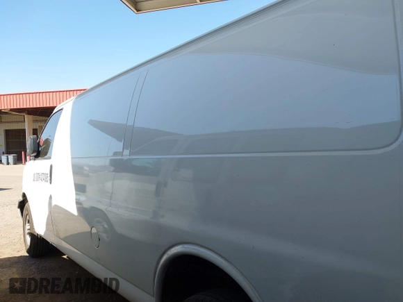 2020 Chevrolet Express Cargo Van with VIN 1GCWGBFP8L1120262, listed as a IAAI auction lot 42010679 with 114,589 mi miles. Bid and sale history available at carsss.com. Image 14.