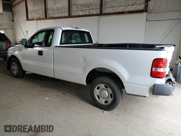 2007 Ford F-150 XL with VIN 1FTRF12297NA82401, listed as a Copart auction lot 58295705 with 198,470 mi miles and Salvage title. Bid and sale history available at DreamBid. Image 2.