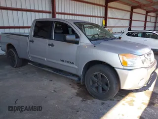 2010 Nissan Titan with VIN 1N6AA0FJ4AN303222, listed as a IAAI auction lot 42787720 with 165,272 mi miles and . Bid and sale history available at DreamBid. Image 1.