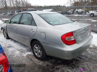 2004 Toyota Camry LE with VIN 4T1BF32K64U588682, listed as a IAAI auction lot 41520570 with 112,646 mi miles. Bid and sale history available at carsss.com. Image 3.